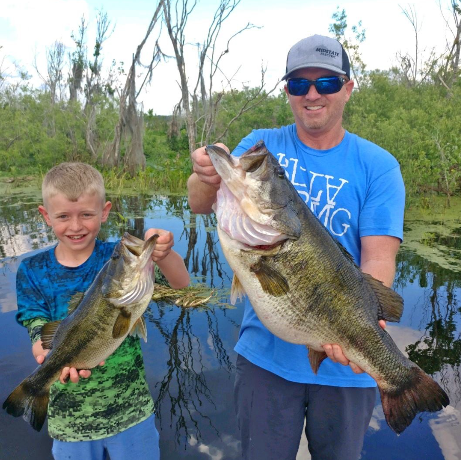 Anglers with trophies in Orange Lake